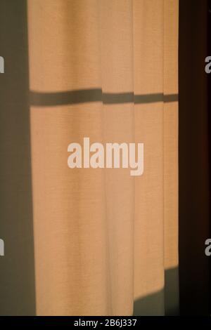 Evening sunlight falls on the curtains Stock Photo