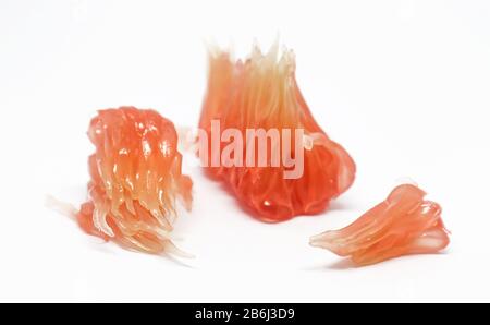 Fresh peeled pomelo fruit isolated on white background Stock Photo