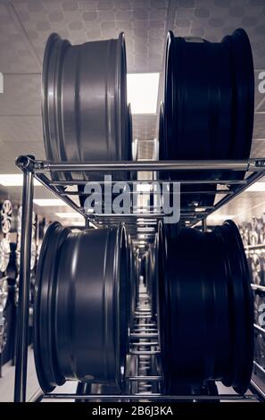 Alloy car wheels in a store Stock Photo