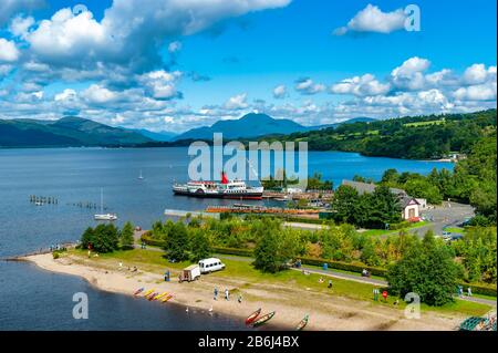 Paddle steamer Maid of the Loch moored at its pier on Loch Lomond at Loch Lomond Shores near Balloch in Scotland Stock Photo