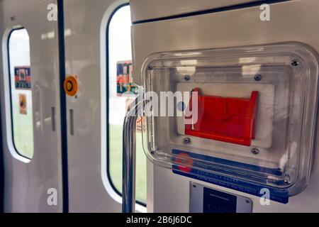 Near plan photo of an emergency brake in a train Stock Photo