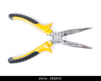 Old pliers with yellow handle isolated on white background Stock Photo