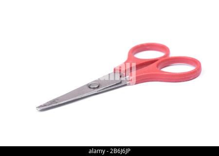 Used baby stationery paper scissors isolated on white background Stock Photo