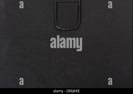 Black artificial leather texture or background Stock Photo