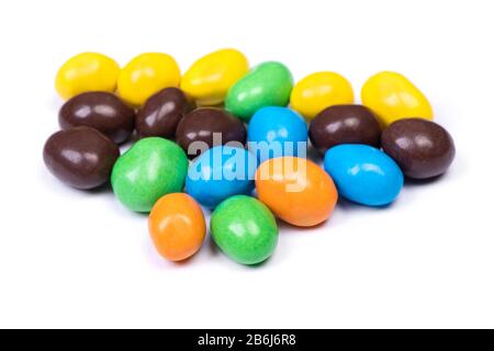Pile of multi-colored glazed jelly beans isolated on white background Stock Photo