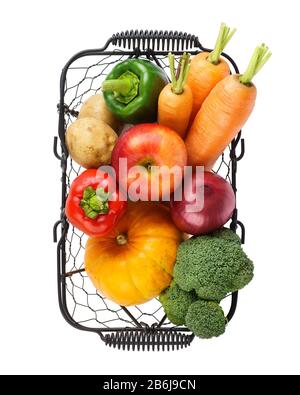 Various fresh vegetables and fruits in a wire basket. Isolated on white. Stock Photo