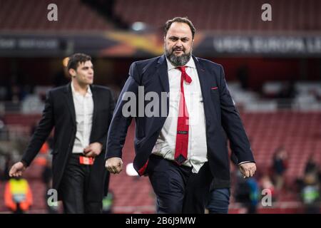LONDON, ENGLAND - FEBRUARY 27: Evangelos Marinakis owner of Olympiacos FC looks on during the UEFA Europa League round of 32 second leg match between Stock Photo
