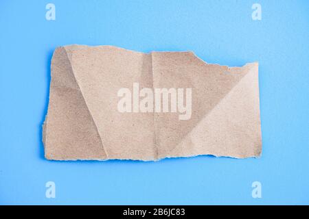 torn paper with blue background, ready for design Stock Photo