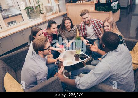 Creative smart young coworkers discussing new project Stock Photo