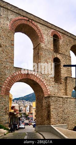 Kavala, Eastern Macedonia, Aegean Sea, Greece, the Roman aqueduct (Kamares) and the city of Kavala, it consists of 60 arches of four different sizes and a maximum height of 52m. and it was reconstructed in 1550 by Suleiman the Magnificent Stock Photo