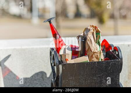 garbage trash bin overflow with waste outdoors Stock Photo