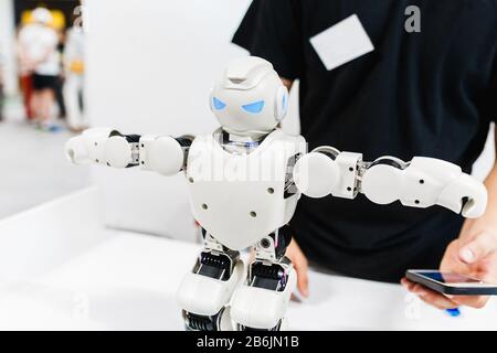 21 AUGUST 2017, ULTRA MALL, UFA, RUSSIA: Smart humanoid Robot dancing Stock Photo
