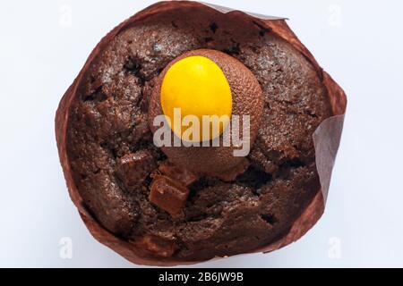 Chocolate Easter Egg muffin fresh from M&S in-store bakery isolated on white background Stock Photo
