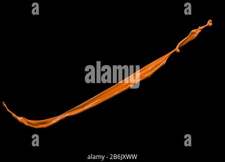 Beautiful orange paint splashes isolated on black background Stock Photo