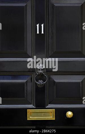 The front door of 11 Downing Street, London, from where Chancellor Rishi Sunak will leave before heading to the House of Commons to deliver his Budget. Stock Photo