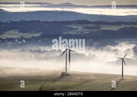 Wind turbines with a fog layer near Ense, 11.12.2013, aerial view, Germany, North Rhine-Westphalia, Sauerland, Ense Stock Photo