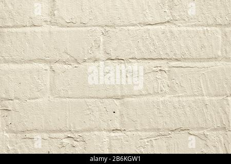 Close up of a beige brick wall. Abstract trendy modern brick texture background Stock Photo