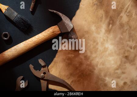 Mock up vintage retro empty space old paper with variation old rusty handy tools, Flat lay top view rustic sheet mockup with copy space great for fath Stock Photo