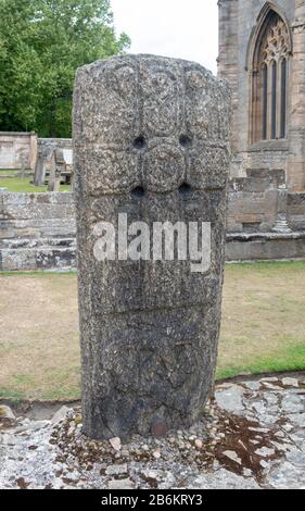 The 9th century carved Pictish cross-slab in the grounds of Elgin Cathedral Stock Photo