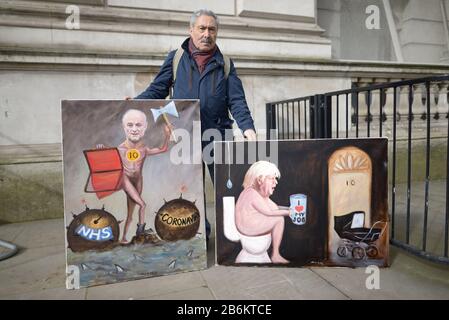 London, UK. 11th Mar, 2020. Chancellor of the Exchequer leaves 11 Downing Street to deliver his first budget amid the increasing social and economic problems caused by the Coronavirus outbreak. Turkish artist Kaya Mar with two of his now ubiquitous paintings for the occasion. Credit: PjrFoto/Alamy Live News Stock Photo