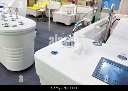 Modern bathtubs and jacuzzi in the store Stock Photo