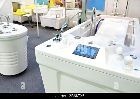 Modern bathtubs and jacuzzi in the store Stock Photo