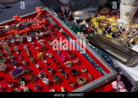 Jewellery for sale at the Marche aux Fluers flea market in Nice, France. Stock Photo