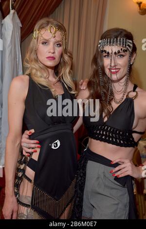 mMODEL WEARING SOLID PURPLE DRESS Stock Photo