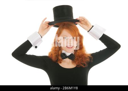Woman as dandy taking  black silk hat off isolated over white background Stock Photo