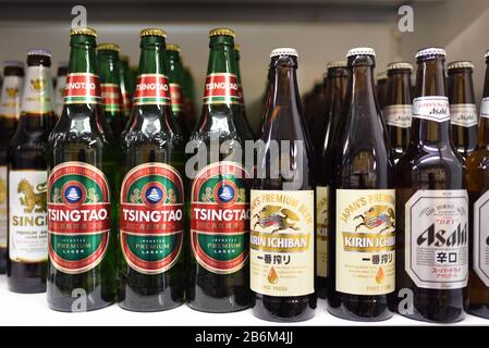 Tsingtao bottles of Chinese beer Tsingtao Brewery Company is part Stock ...
