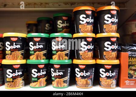 Display of Instant Noodles, Pot Noodles or Cup Noodles, including Peking Duck Flavour, in Chinese or Asian Supermarket Stock Photo