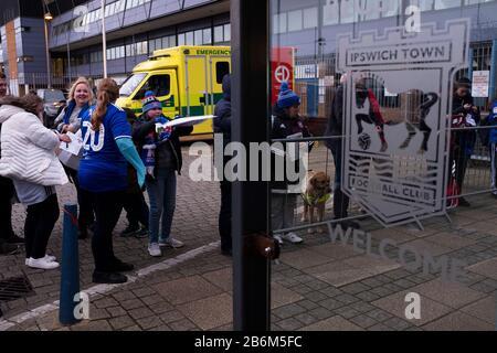 Home fans waiting outside the stadium for autographs after Ipswich Town played Oxford United in a SkyBet League One fixture at Portman Road. Both teams were in contention for promotion as the season entered its final months. The visitors won the match 1-0 through a 44th-minute Matty Taylor goal, watched by a crowd of 19,363. Stock Photo