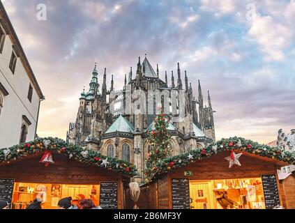 DECEMBER 2017, PRAGUE, CZECH REPUBLIC: Christmas market fair at Old town square with tourists and New Year tree Stock Photo