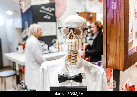 DECEMBER 2017, PALLADIUM MALL, PRAGUE, CZECH REPUBLIC: funny Human skeleton in medical costume and glasses Stock Photo