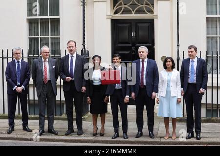 London, London, UK. 11th Mar, 2020. Rishi Sunak (4th R), Britain's Chancellor of the Exchequer, poses for a picture with members of his treasury team as he leaves 11 Downing Street to deliver his budget to Parliament, in London, Britain on March 11, 2020. Credit: Tim Ireland/Xinhua/Alamy Live News Stock Photo