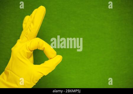 Product for professional cleaning on green background Stock Photo