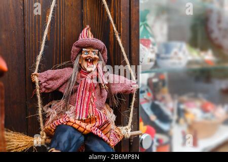 Toy evil witch as souvenir for sale Stock Photo