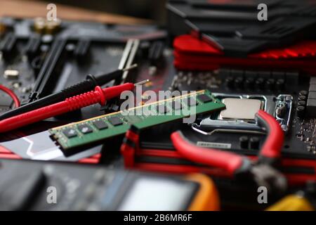 Computer components lying at worktable ready to be repaired Stock Photo