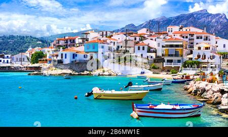 Turquoise sea,colorful houses and mountains,Kokkari village,Samos island,Greece. Stock Photo