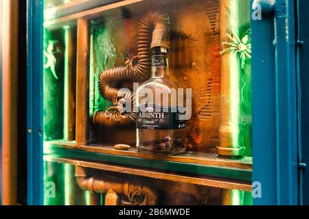 DECEMBER 2017, PRAGUE, CZECH REPUBLIC: Showcase of a museum and a bar dedicated to alcoholic beverage absinthe Stock Photo