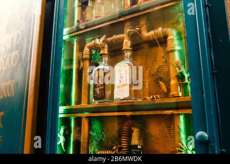 DECEMBER 2017, PRAGUE, CZECH REPUBLIC: Showcase of a museum and a bar dedicated to alcoholic beverage absinthe Stock Photo