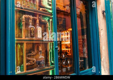 DECEMBER 2017, PRAGUE, CZECH REPUBLIC: Showcase of a museum and a bar dedicated to alcoholic beverage absinthe Stock Photo