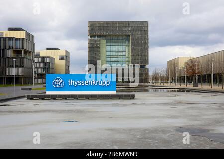 Essen, Ruhr Area, North Rhine-Westphalia, Germany - ThyssenKrupp headquarters, ThyssenKrupp Quarter with company logo in front of the main building Q1 Stock Photo