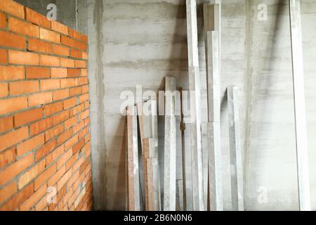 Set of finishing building tools standing at wall Stock Photo