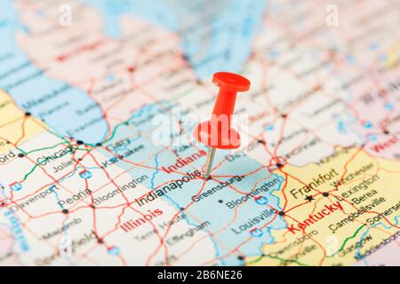 Red clerical needle on a map of USA, Indiana and the capital Indianapolis. Close up map of Page protected with pending changes Indiana with red tack, Stock Photo