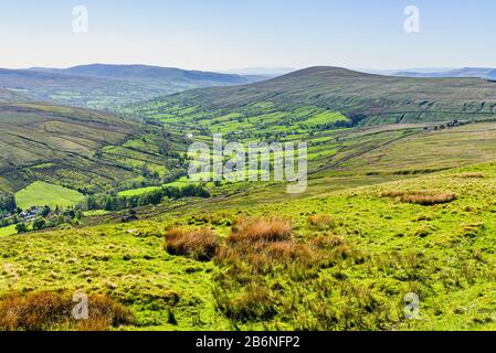 View over Dentdale in the Yorkshire Dales, from the Driving Road (Pennine Bridleway) with the Lakeland Fells on the skyline Stock Photo