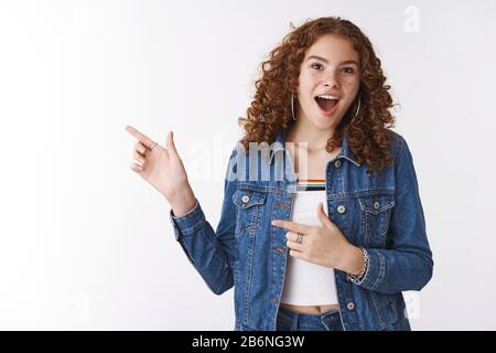 Surprised excited attractive emotive good-looking young ginger female  college student post acne scars drop jaw impressed say wow thrilled widen  eyes Stock Photo - Alamy