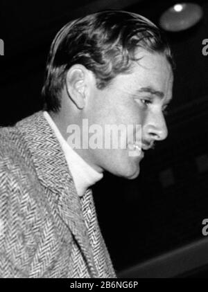 Vintage photo of Australian-born movie star Errol Flynn (1909 – 1959). The photo by Harris & Ewing was taken on January 25 1939 at a horseshow held at Fort Myer, Virginia, as part of birthday celebrations for President Franklin D Roosevelt. Stock Photo