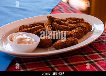 Fish Finger batter fry served with dipping sauce, Indian seafood starters Stock Photo