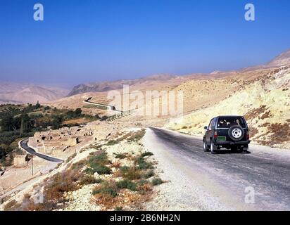 Stunning view of the Kings Highway, beautiful curvy road running through the Wadi Rum desert and canyons, Jordan. Stock Photo